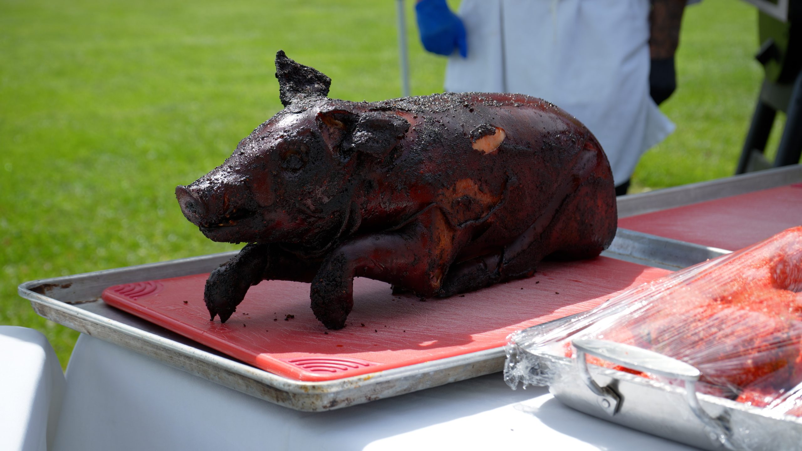 a finished pig ready to be sliced and served